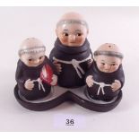 A Goebel Hummel four piece novelty cruet set in the form of monks