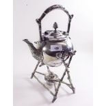 A Victorian silver plated tea kettle on branch form stand