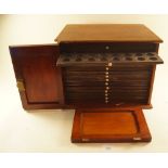 A coin collectors wooden cabinet, approx 300 x 260 x 250 mm height containing 15 tiers, a/f