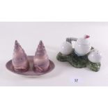 A novelty golf cruet set and a shell cruet set