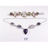 A silver agate necklace and another silver bracelet