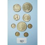 A quantity of USA coins including: dimes 1923, 35, 42 and 1952, quarter dollar 1946, half dollar