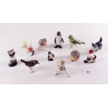 A collection of eleven Goebel figures including birds and penguins