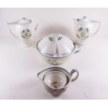 A Susie Cooper dinner service comprising eight dinner plates, six breakfast plates, six side plates,