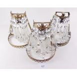 Three cut glass basket form wall lights