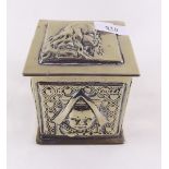 A 1930's brass Alice in Wonderland tea caddy embossed Alice, The Mad Hatter, The White Rabbit