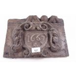 A 17th century carved wood and gesso plaque dated 1667 in cartouche - 21 x 30cm
