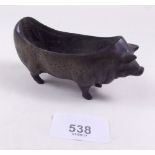 A Victorian bronze pig form pin cushion - lacking cushion - 11cm