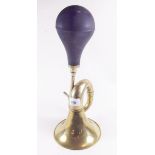 A large old brass car horn