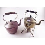 A copper kettle and a brass spirit kettle
