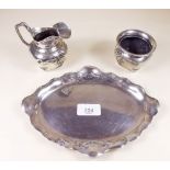 A German silver cream and sugar on tray with Art Nouveau sinuous decoration, with German hallmarks