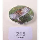 A silver oval pill box painted enamelled owl to lid