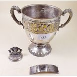 A silver menu holder a/f, a silver engraved plaque and a silver plated trophy cup