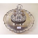 A silver plated tray and silver plated eggcup stand