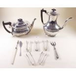 A silver plated teapot, coffee pot, toast rack and various cutlery