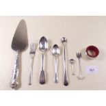 A group of silver cutlery to include cake slice etc including a silver teaspoon, Exeter 1863 by