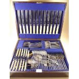 A Gladwin silver plated canteen of cutlery in oak case - twelve place settings