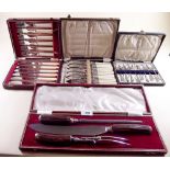 A carving set, two fish cutlery sets and a teaspoon set - all cased