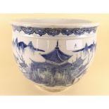 An early 20th century Chinese jardiniere decorated fisherman and landscape, four character mark -