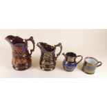 Three Victorian copper lustre jugs and a mug