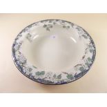 A Royal Doulton fruit bowl with blossom printed border - 31cm