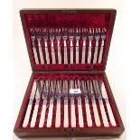 A Victorian silver plated and bone handled dessert cutlery set including tea knives, cake forks, tea