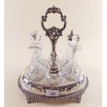 A Victorian silver plated and cut glass condiment set on stand