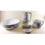 A Bonn floral painted toiletry set comprising toiletry jug, bowl, soap dish and chamber pot
