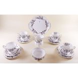 A Royal Albert tea service 'Lorraine' comprising: eleven cups and twelve saucers, eleven tea plates,