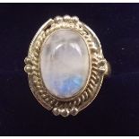 A silver and rainbow moonstone ring, size N