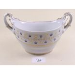 A large 19th century oval porcelain sugar bowl with blue floral decoration on a white ground