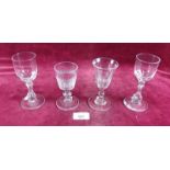 Four 19th century cut glass drinking glasses
