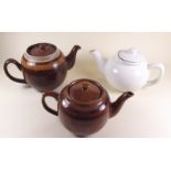 Three various pottery teapots