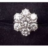 An 18 carat white gold large brilliant cut diamond cluster ring, overall diamond weight 2.72