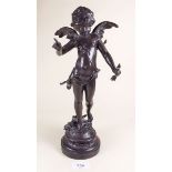 A bronze finish spelter cupid, arm repaired - 30cm
