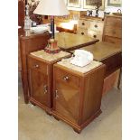 A pair of Art Deco marble topped bedside cabinets with drawer over cupboard