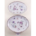 A pair of 18th century Chinese famille rose oval dishes painted sprays of flowers - 23 x 17.5cm