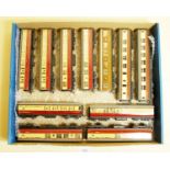 A collection of eleven unboxed coaches including LNER 45401 3rd Class, two Western Region trains