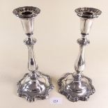 A pair of 19th century Sheffield silver plated candlesticks