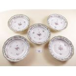 Five small 18th century Chinese famille rose dishes painted ribbons and flowers in European