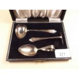 A silver three piece christening set - cased - Birmingham 1936