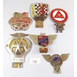 A group of car badges including Triumph, Chiltern, Stafford etc