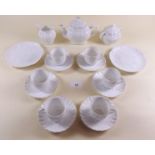 A Victorian white porcelain dolls tea service comprising: 6 cups and saucers teapot, sugar bowl,