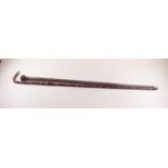 A rosewood handled walking cane and a bamboo walking stick with gold plated handle