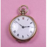 An 18 carat gold small fob watch