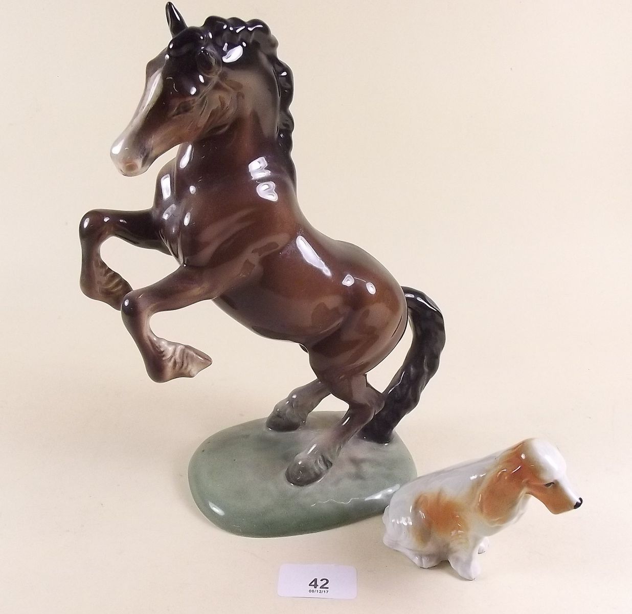 A Beswick rearing horse and a dog