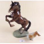 A Beswick rearing horse and a dog