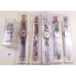 A collection of Swatch watches