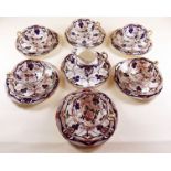 A Victorian Imari style tea service comprising six cups and saucers, six tea plates and jug