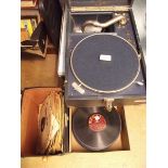 A 'His Masters Voice' table top gramophone and two boxes of gramophone records